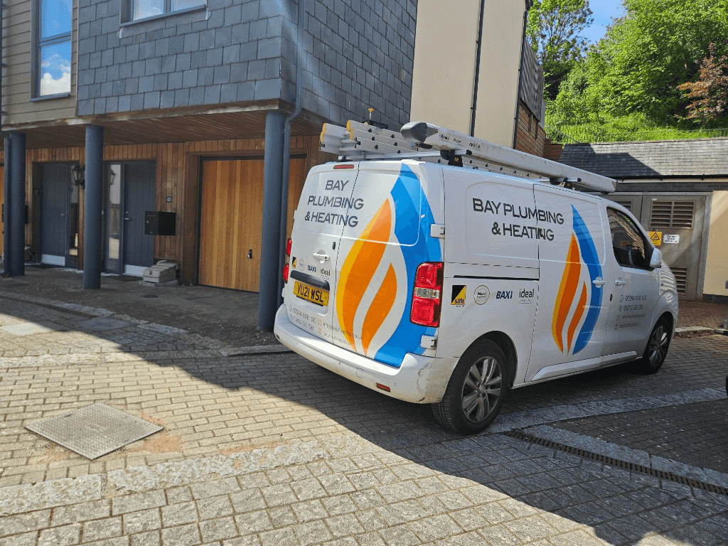 Bay Plumbing and Heating van outside a local Torbay property