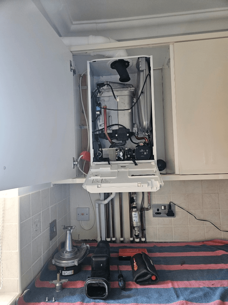 Open boiler casing and service tools during boiler servicing