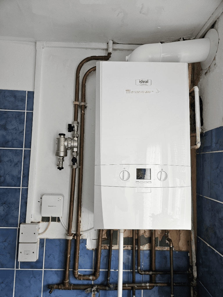 Ideal boiler installation in a tiled kitchen setting