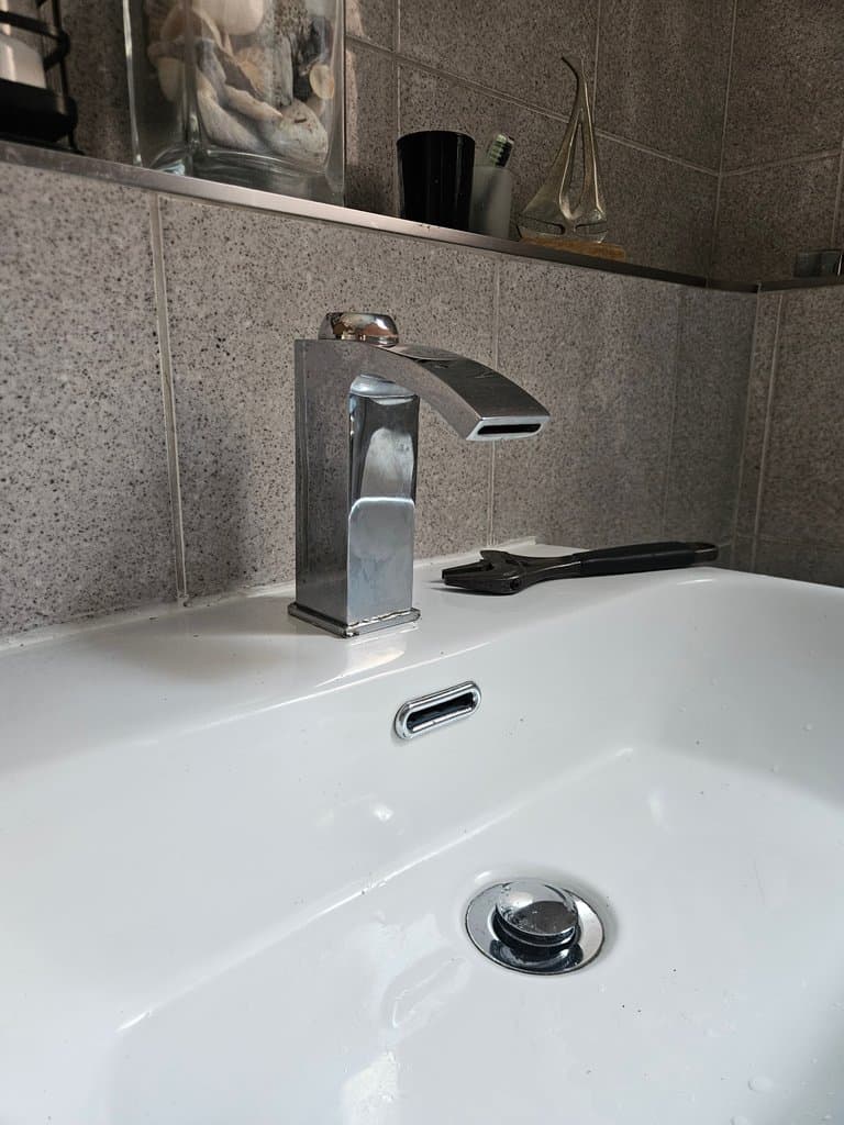 Basin tap replacement work in progress in Torquay