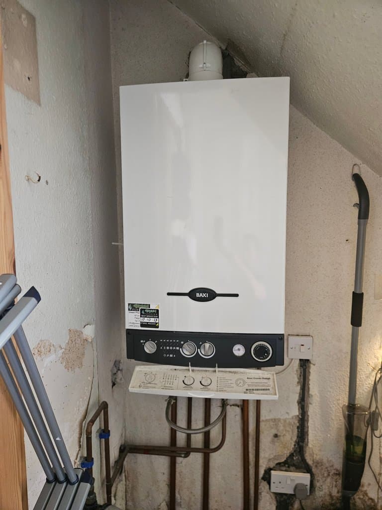 Old Baxi boiler before removal at a Torquay property