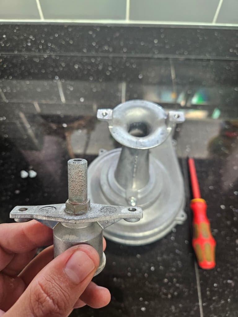 Dirty gas injector with visible build-up found during a noisy boiler service in Torquay